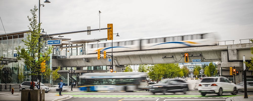 A SkyTrain leaving a station